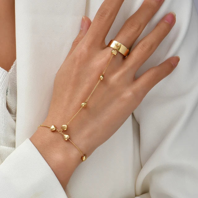 Pixi | Goudkleurige Handketting met Hartdetails