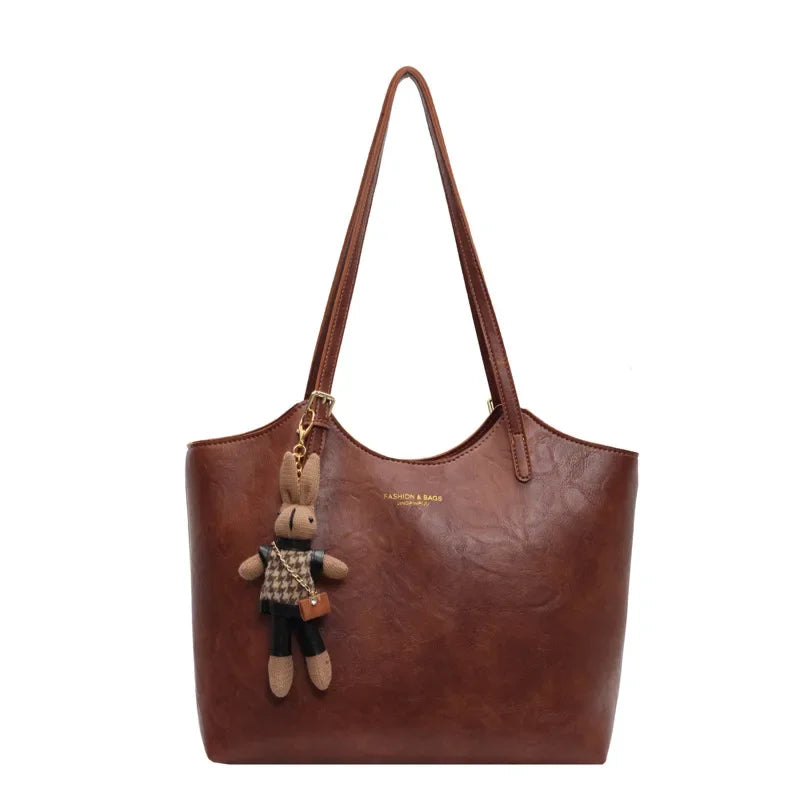 Tazia | Klassieke Shopper met Charm-Detail