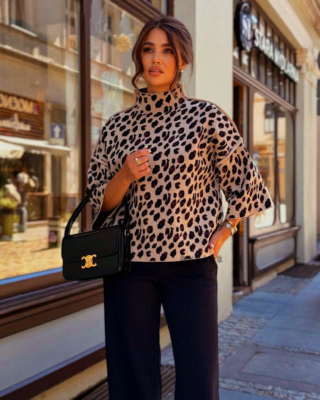 Trendy Dames Trui met Luipaardprint en Hoge Hals