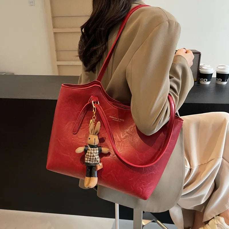 Tazia | Klassieke Shopper met Charm-Detail