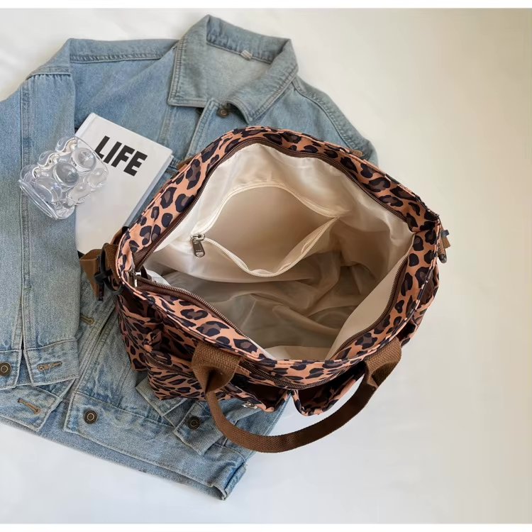 Tessi | Praktische Leopard Schoudertas met Vakken