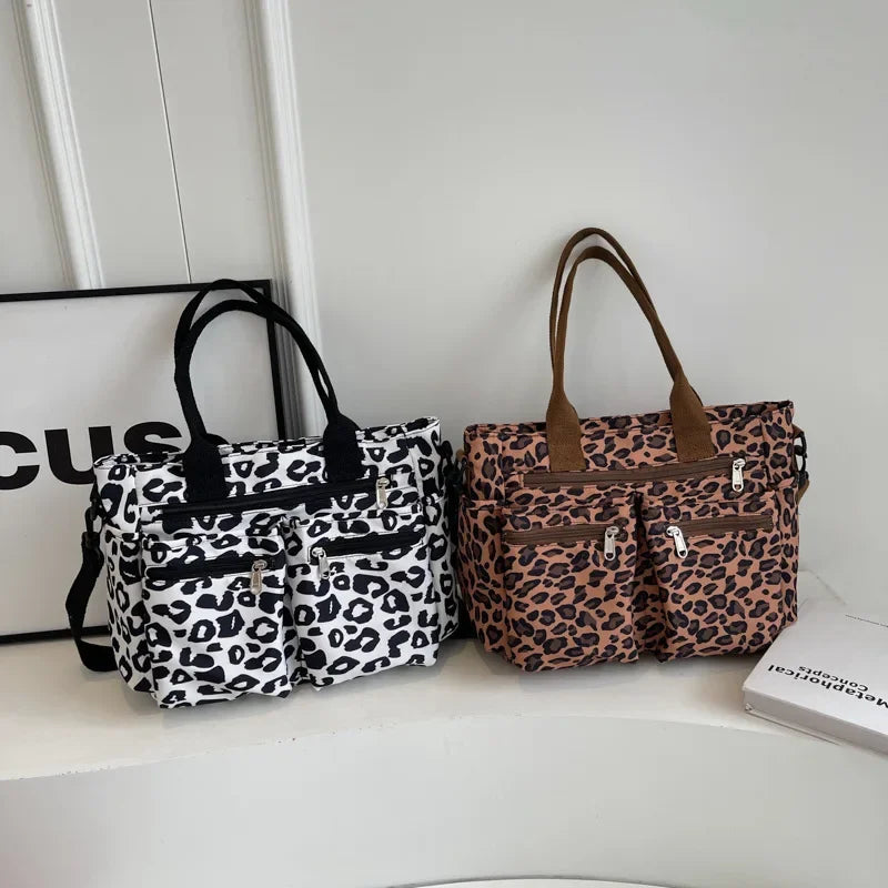 Tessi | Praktische Leopard Schoudertas met Vakken
