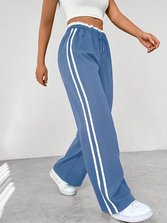 Kaeli | Sportieve High Waist Joggingbroek met Strepen