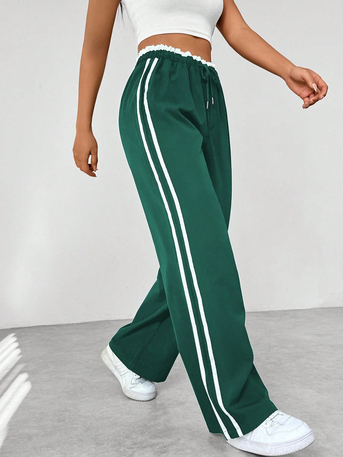 Kaeli | Sportieve High Waist Joggingbroek met Strepen