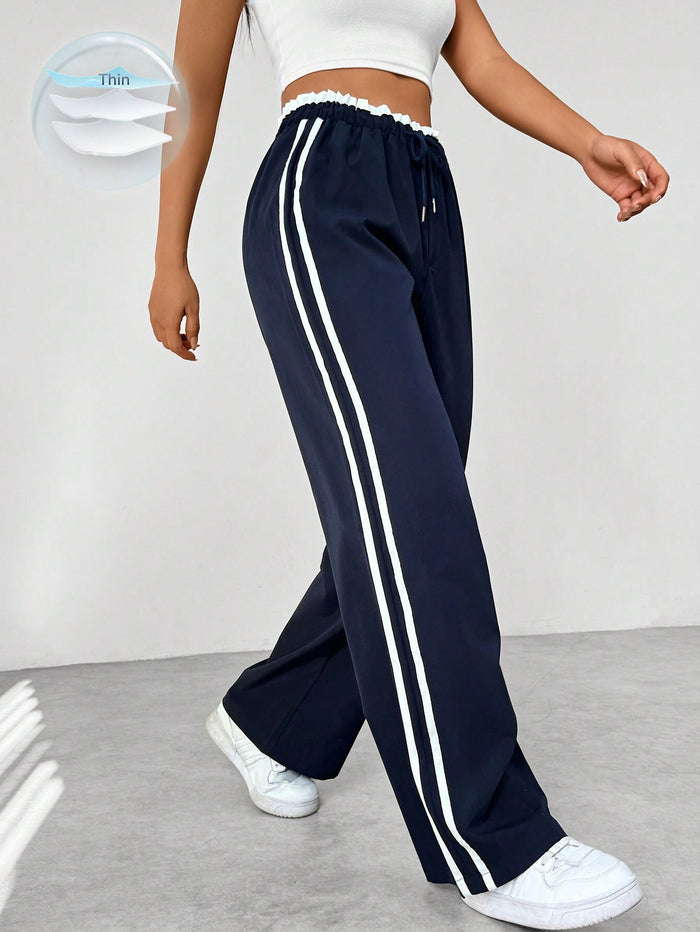 Kaeli | Sportieve High Waist Joggingbroek met Strepen