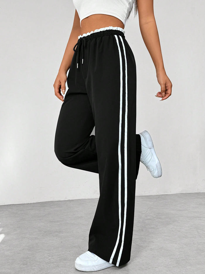 Kaeli | Sportieve High Waist Joggingbroek met Strepen